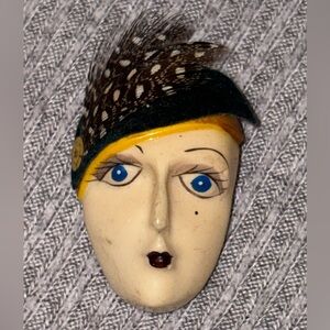 Vintage blue eyed flapper lady brooch